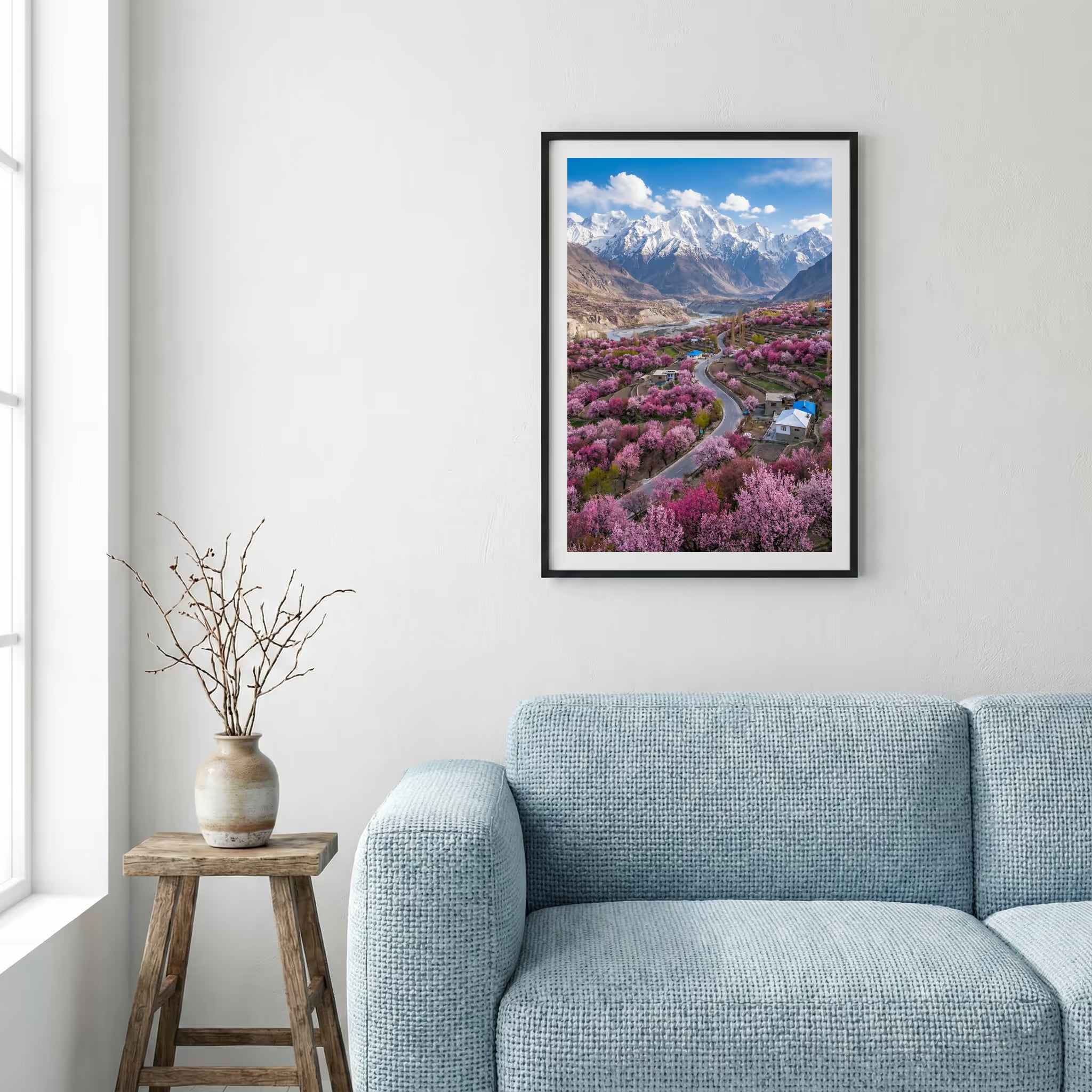 Aerial view of a blossoming valley with a road and a snow-capped mountain beyond — framed canvas wall art in a wooden frame, 16×24 in