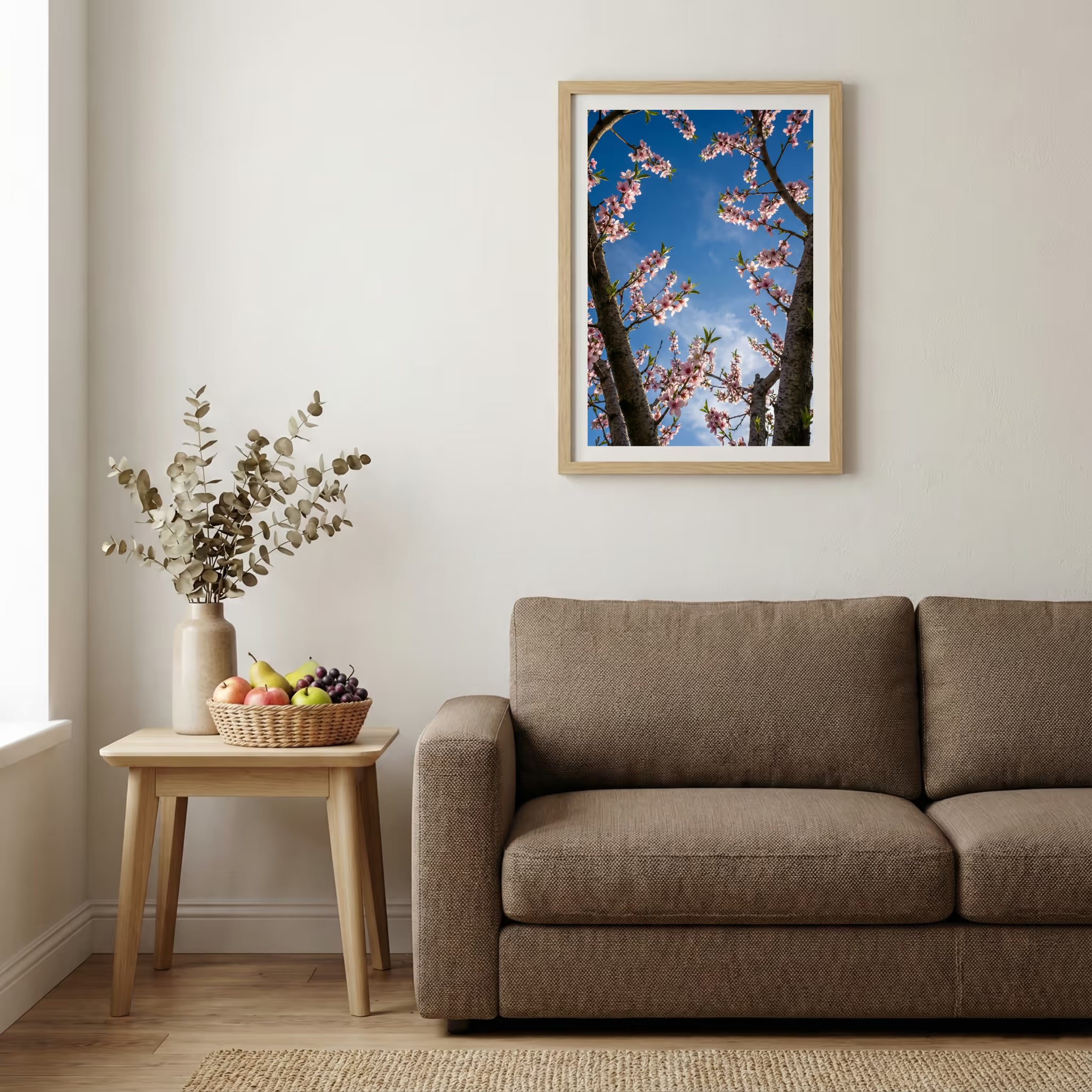Pink blossom branches reaching into a vivid blue sky — wooden-frame wall art print, 20×30 in