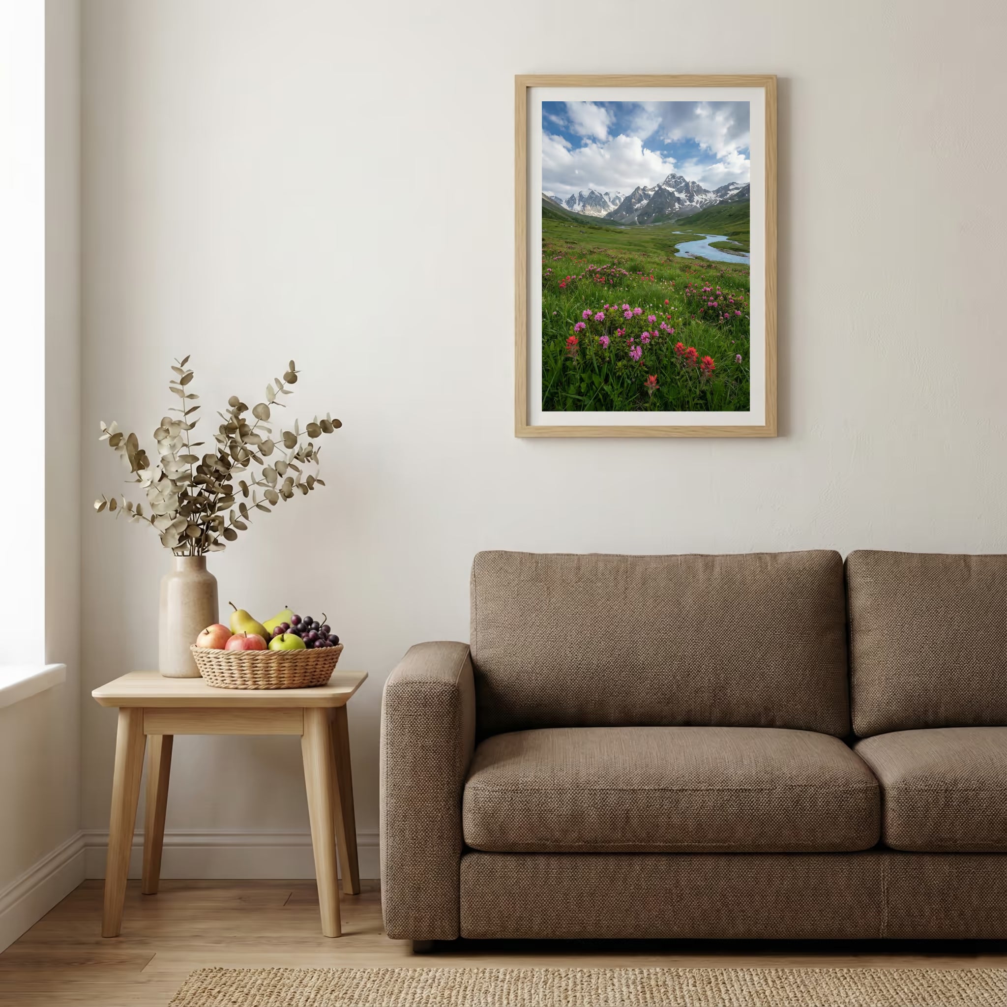 Pink wildflowers beside a mountain stream with snow-capped peaks beyond — wooden-frame wall art print, 20×30 in