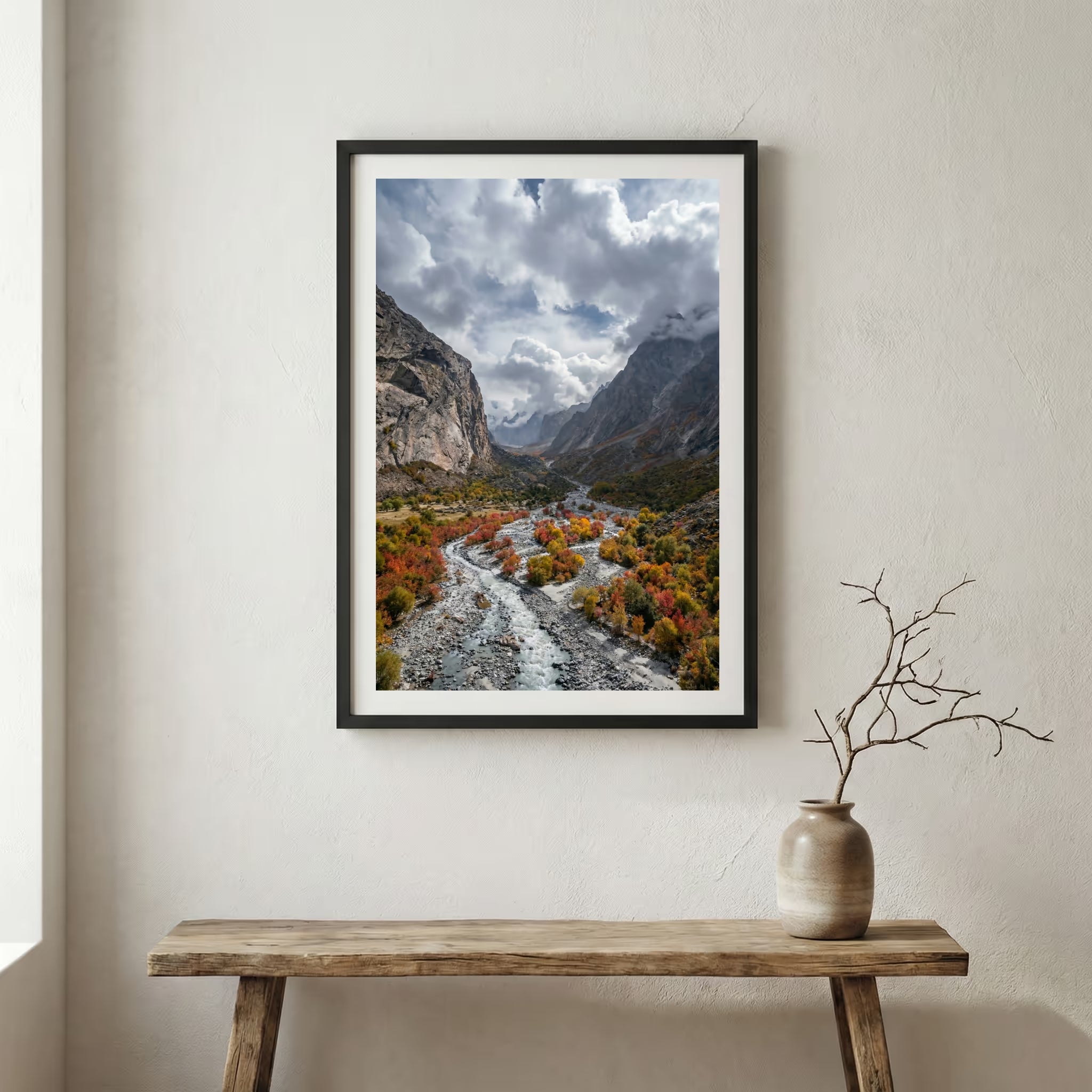 Braided river bed winding through autumn-red shrubs and mountains — wooden frame canvas wall art print, 12×18 in