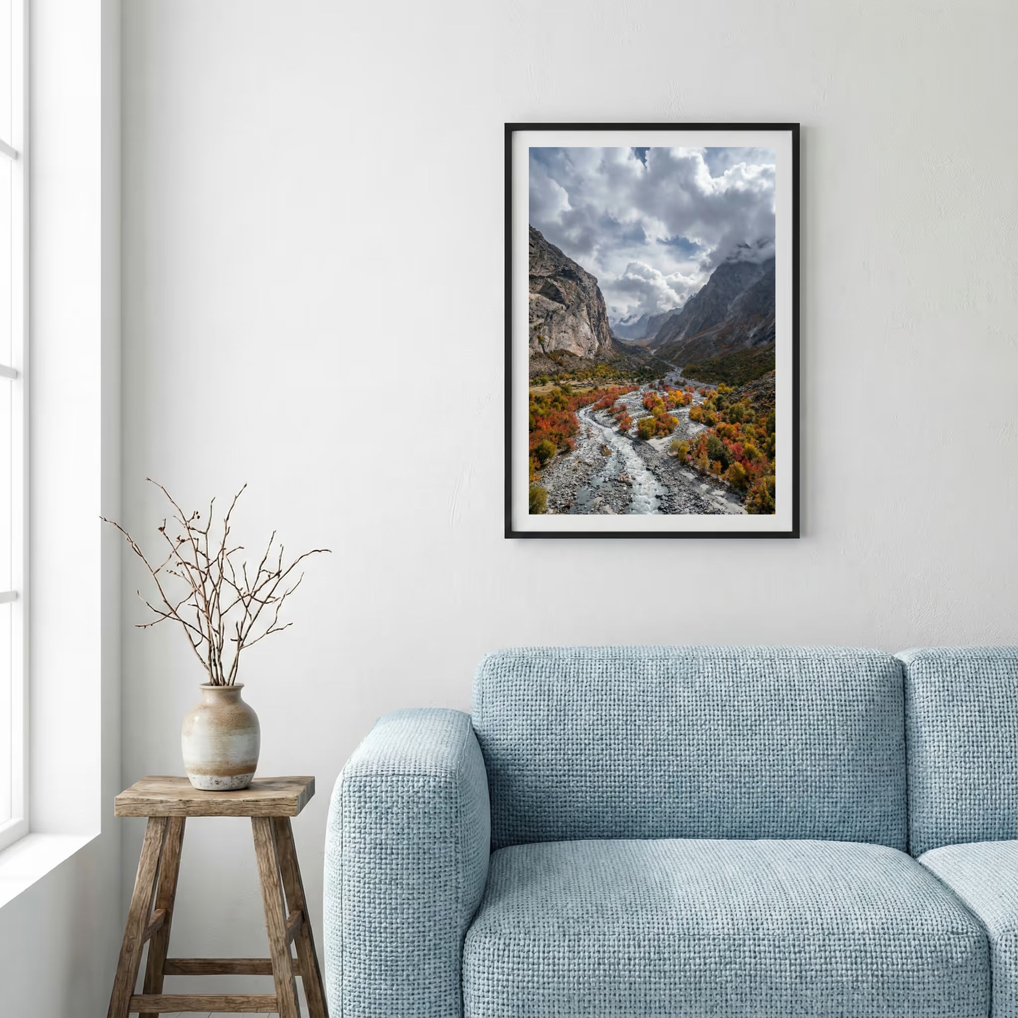 Braided river bed winding through autumn-red shrubs and mountains — framed canvas wall art in a wooden frame, 16×24 in